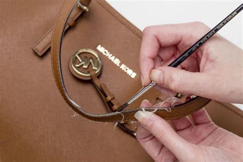 how to fix a michael kors purse strap|Michael Kors purse strap repair.